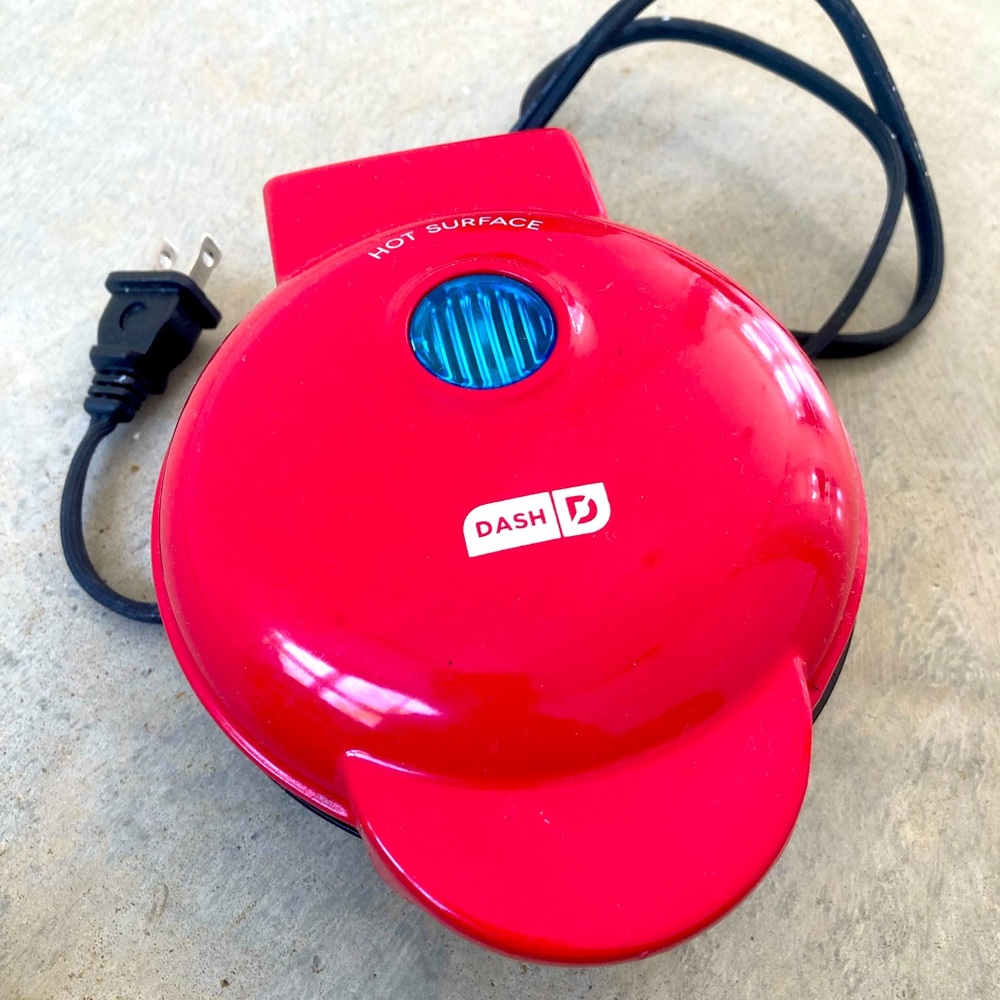 Dash mini waffle maker red.